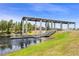 Scenic view of the community dock, perfect for enjoying waterfront activities and serene views at 2680 Nottel Dr, St Cloud, FL 34772