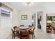 Dining room with a modern wooden table and chairs at 2680 Nottel Dr, St Cloud, FL 34772