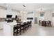 Spacious kitchen with an oversized center island, stainless steel appliances, and an adjacent dining area at 2680 Nottel Dr, St Cloud, FL 34772
