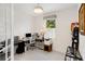 Bright office space with a large window and neutral decor at 2680 Nottel Dr, St Cloud, FL 34772