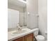 Bright bathroom features a neutral color scheme, vanity with sink and toilet at 2718 Bushman Dr, Kissimmee, FL 34746