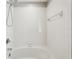 Bright bathroom features a tiled tub/shower combination at 2718 Bushman Dr, Kissimmee, FL 34746