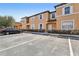Exterior view of condo with parking and landscaping at 2718 Bushman Dr, Kissimmee, FL 34746