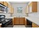 Well-lit kitchen with ample counter space and sleek appliances at 2718 Bushman Dr, Kissimmee, FL 34746