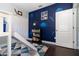 Cozy bedroom with custom space-themed wall art and playful decor at 2739 Village Pine Ter, Orlando, FL 32833