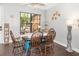 Charming dining area with stylish table set, natural light, and neutral paint at 2739 Village Pine Ter, Orlando, FL 32833