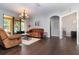 Cozy living room featuring sliding glass doors, neutral paint, and stylish furnishings at 2739 Village Pine Ter, Orlando, FL 32833