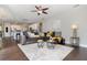 Open-concept living room featuring modern decor and beautiful furniture at 2739 Village Pine Ter, Orlando, FL 32833