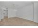 Bright bedroom with tile floors, a ceiling fan, and a minimalist design with white walls and trim at 312 Grand Bay Ln, Celebration, FL 34747