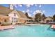Enjoy this spacious community pool with lounge seating and a charming gazebo at 312 Grand Bay Ln, Celebration, FL 34747