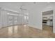 Open living space with tile floors, ceiling fan, and easy access to the kitchen at 312 Grand Bay Ln, Celebration, FL 34747