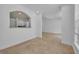 Bright living room with an arched opening to the kitchen, perfect for entertaining and modern living at 312 Grand Bay Ln, Celebration, FL 34747