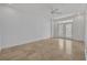 Bright living room with tile floors and glass doors leading to outdoor space at 312 Grand Bay Ln, Celebration, FL 34747