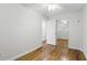 Bright bedroom with hardwood floors and a mirrored closet door at 320 Lakeview St # 222, Orlando, FL 32804