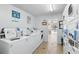 Bright laundry room offering coin and app-operated washers and dryers for residents' convenience at 320 Lakeview St # 222, Orlando, FL 32804