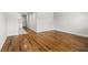 An open living space features hardwood floors and neutral walls, providing a blank canvas for personalization and decor at 320 Lakeview St # 222, Orlando, FL 32804
