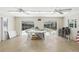 The poolside room has sliding glass doors offering views and access to the outdoor pool at 320 Lakeview St # 222, Orlando, FL 32804