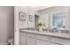 Bathroom featuring double vanity and granite countertops at 3206 Partington Blvd, Davenport, FL 33837