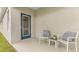 Outdoor patio with chairs at 3206 Partington Blvd, Davenport, FL 33837