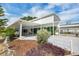 Exterior view of a single-story home with a carport and a well-maintained landscape at 367 Par Pines Blvd, Davenport, FL 33837