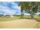 Picturesque golf course view with mature trees and a scenic landscape at 367 Par Pines Blvd, Davenport, FL 33837