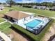 Aerial view of sparkling pool surrounded by lounge chairs, offering relaxation and leisure at 367 Par Pines Blvd, Davenport, FL 33837