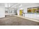 Bright sunroom with a wet bar, tile countertops, and slider door at 367 Par Pines Blvd, Davenport, FL 33837