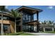 Stunning clubhouse showcasing contemporary architecture, large windows, and inviting entrance at 4718 Yellow Elder Way, Kissimmee, FL 34758