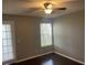 Bedroom featuring a ceiling fan and a sliding glass door at 5160 Conroy Rd # 1423, Orlando, FL 32811