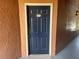 Front door with unit number 1423 in a hallway at 5160 Conroy Rd # 1423, Orlando, FL 32811