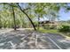 The Forest Club clubhouse surrounded by trees and a parking lot at 551 Pine Needle Ct, Lake Mary, FL 32746