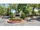 Entrance Sign of The Forest Club community surrounded by lush landscaping at 551 Pine Needle Ct, Lake Mary, FL 32746