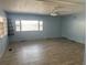 Living room with large window, vinyl flooring, and ample light at 551 Pine Needle Ct, Lake Mary, FL 32746