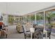 A comfortable community lounge area with plush seating and a view of the pool at 551 Pine Needle Ct, Lake Mary, FL 32746