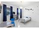 bedroom with a fun space theme and a twin-sized bed at 5511 Orange Orchard Dr, Winter Garden, FL 34787
