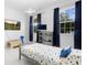 Colorful bedroom with a space-themed decor and a twin bed at 5511 Orange Orchard Dr, Winter Garden, FL 34787