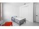 Small bedroom with a twin bed and closet at 5511 Orange Orchard Dr, Winter Garden, FL 34787