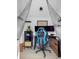 Studio with desk, blue gaming chair and monitor, perfect for a home office or creative workspace at 5511 Orange Orchard Dr, Winter Garden, FL 34787