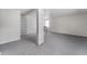 An expansive bonus room boasts new carpet and abundant natural light, offering endless possibilities for customization at 55119 5Th St, Astor, FL 32102