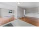 Inviting entryway with hardwood floors, neutral walls, and contemporary lighting, seamlessly connects to the living spaces at 55119 5Th St, Astor, FL 32102