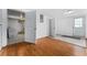 View of laundry area and access to the backyard through a glass door at 55119 5Th St, Astor, FL 32102