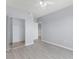 Bright bedroom with modern ceiling fan, neutral walls, and a closet at 5530 Metrowest Blvd # 309, Orlando, FL 32811
