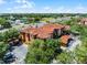 Aerial view of the apartment buildings and surrounding landscape at 5566 Metrowest Blvd # 304, Orlando, FL 32811
