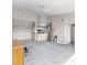 Open concept living area with modern fixtures, view of the kitchen, and lots of natural light at 5566 Metrowest Blvd # 304, Orlando, FL 32811