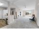 Bright living area with an open layout, kitchen access, and plenty of space for furniture at 5566 Metrowest Blvd # 304, Orlando, FL 32811