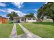 A single-story home with driveway and a classic exterior at 5601 Andora St, Orlando, FL 32807