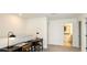 Upstairs hall features two desks and opens to the bedrooms and main living area at 5657 Loggia Ln, Kissimmee, FL 34758