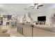 Open living area that connects the kitchen and dining room at 6822 Habitat Dr, Harmony, FL 34773