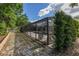 A screened-in pool is featured in this backyard at 694 Tuscora Dr, Winter Springs, FL 32708