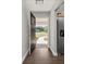 Open foyer with tile flooring, stainless refrigerator, and view of front yard at 694 Tuscora Dr, Winter Springs, FL 32708